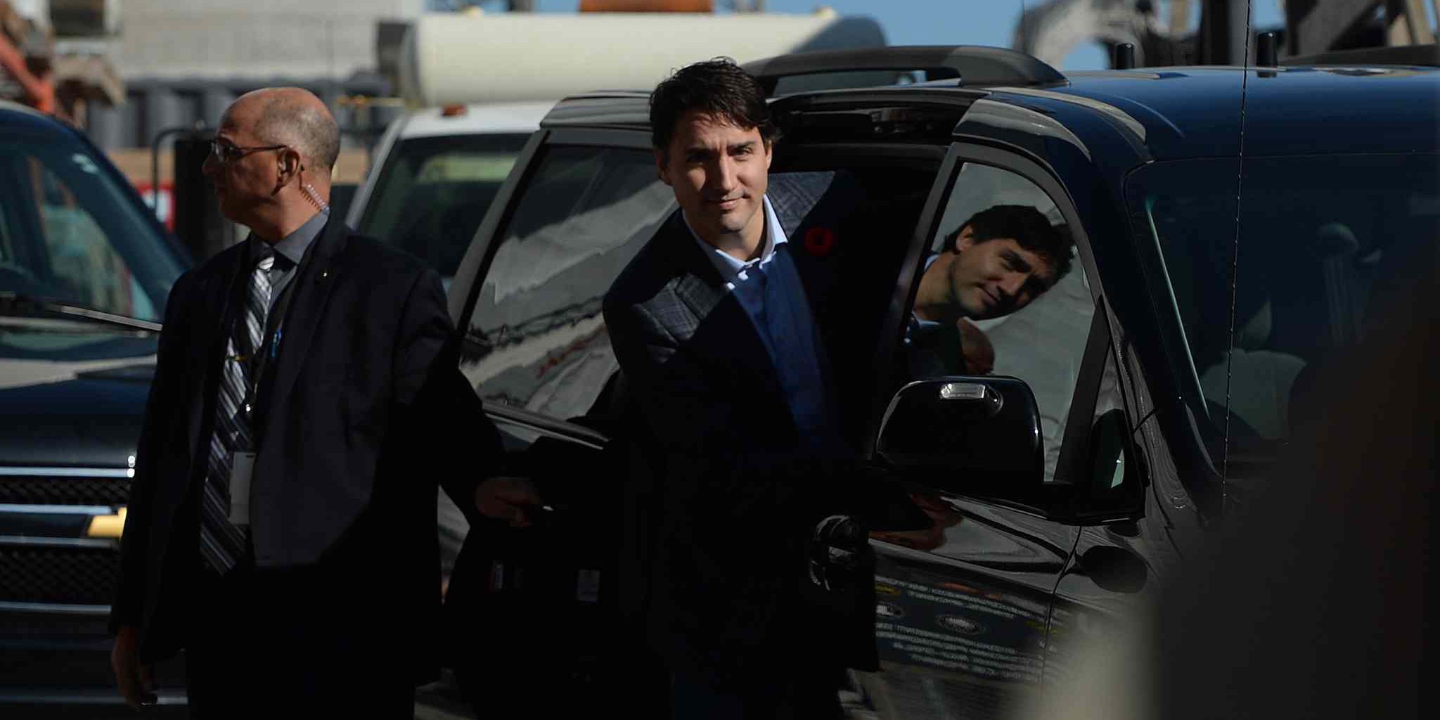 Prime minister-designate Justin Trudeau enters his car after taking a tour of the West Block construction site on Parliament Hill in Ottawa on Tuesday, November 3, 2015. THE CANADIAN PRESS/Sean Kilpatrick